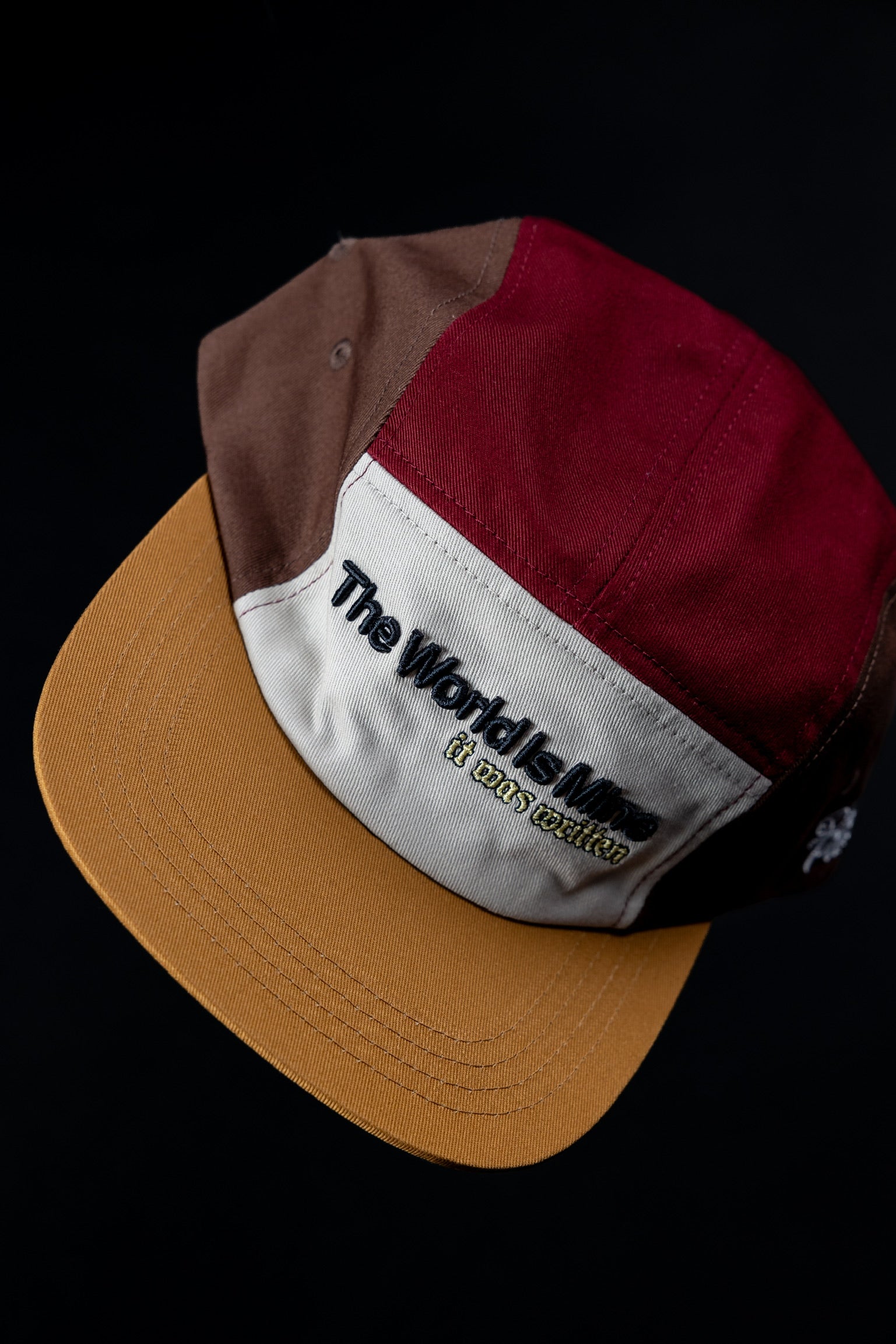Brown, burgundy, and honey yellow "imagine that" 5ive Panel Hat with "The World Is Mine" on front 