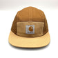 Tan and brown Carhartt 5 panel hat with logo on the front, white background.