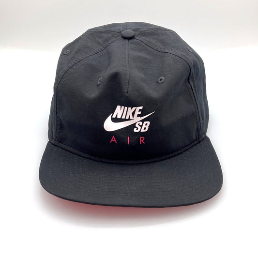 Nike Air SB Black 5 Panel Hat, Nike Air SB logo on front, with white background.