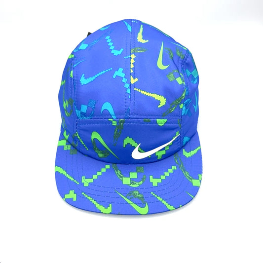Blue NIKE Swim Shorts upcycled into a 5 Panel Hat, iconic swoosh NIKE logo in front, with a white background.