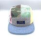Camo, blue, green, grey and pink patchwork Polo 5 Panel Hat upcycled, iconic Polo RL logo on the front, with a white background.