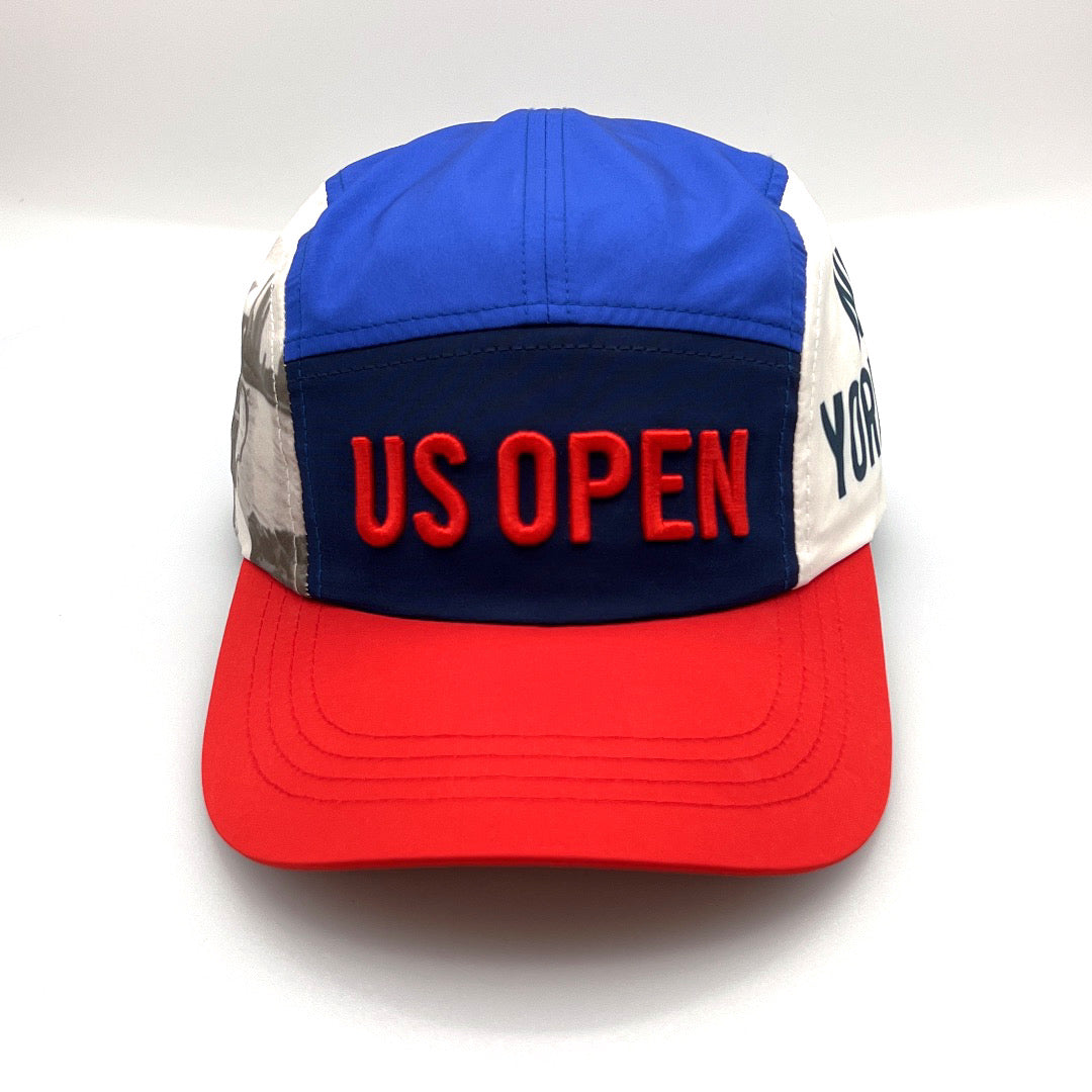 2022 red, white and blue US Open 5 Panel Hat, embroidered logo on the front, with a white background. 