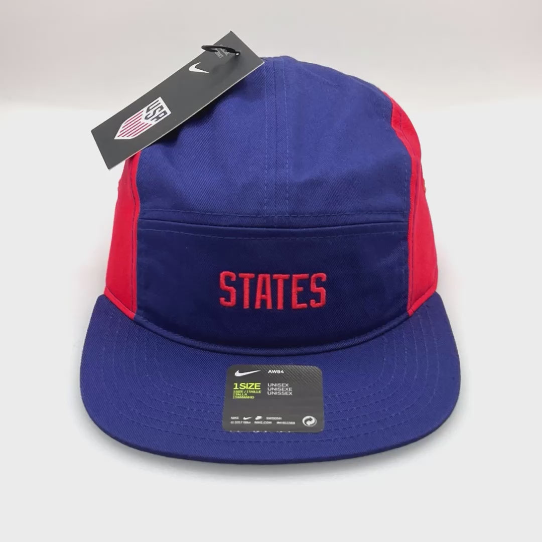 Spinning red and blue Olympics Nike "States" 5 Panel Hat, "States" on the front, with a white background.