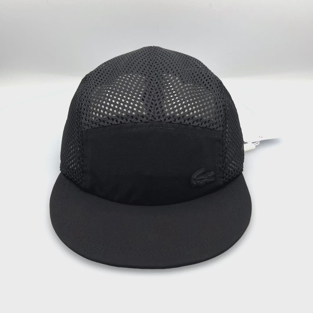 Spinning black Lacoste 5 Panel Hat mesh side and top panels, alligator logo on front panel, with white background.