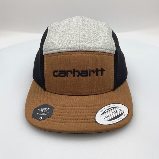 Spinning Grey, black and brown Carhartt 5 panel hat with embroider logo on the front, white background.
