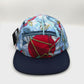Spinning nylon Navy, red and baby blue Paper Planes 5 Panel Hat, with a white background.