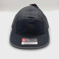 Spinning nylon black poka dots Under Armour 5 Panel Hat, with a white background.