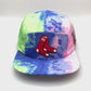 Spinning Multi colored tie dye MLB RedSox 5 Panel Hat, red sox logo on front, with white background.